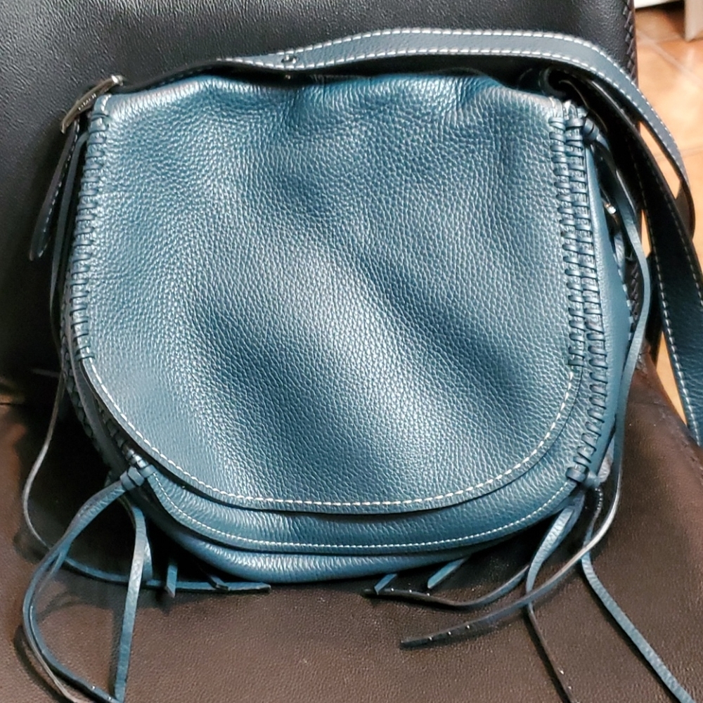 Coach crossbody bag with tassels teal